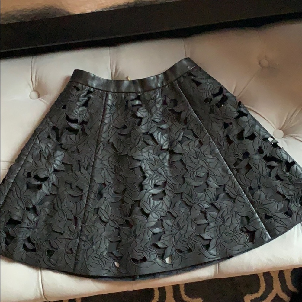 Black leather cut out skirt